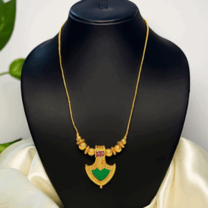 Gold tone green palakka necklace